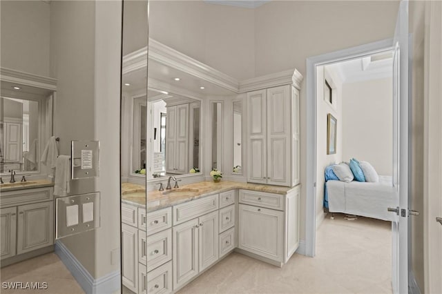 full bathroom featuring connected bathroom, vanity, and a towering ceiling