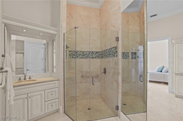 full bathroom featuring connected bathroom, a stall shower, vanity, and ornamental molding