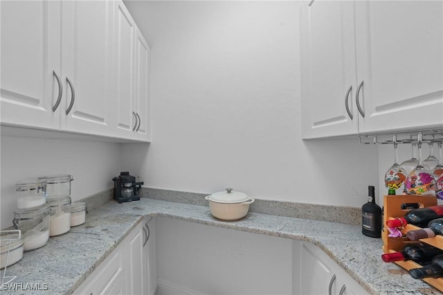 kitchen with white cabinetry