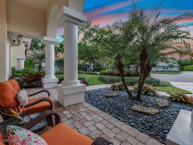 762 Lynnmore Ln E, Naples, FL 34108 - view of patio featuring covered porch