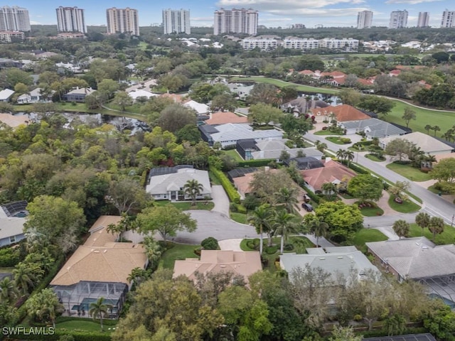 birds eye view of property with a city view