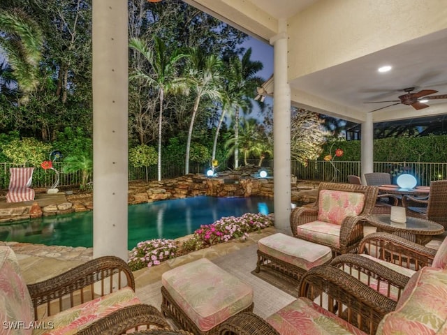 762 Lynnmore Ln E, Naples, FL 34108 - view of patio featuring fence, a ceiling fan, outdoor dining space, and a fenced in pool