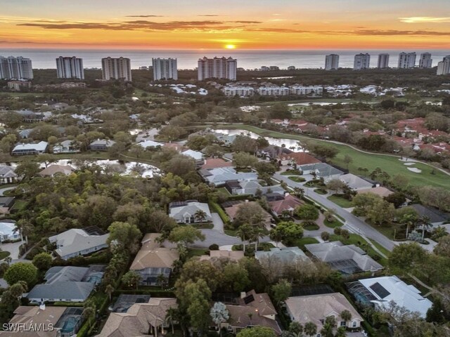 762 Lynnmore Ln E, Naples, FL 34108 - bird's eye view with a water view, a residential view, and a view of city