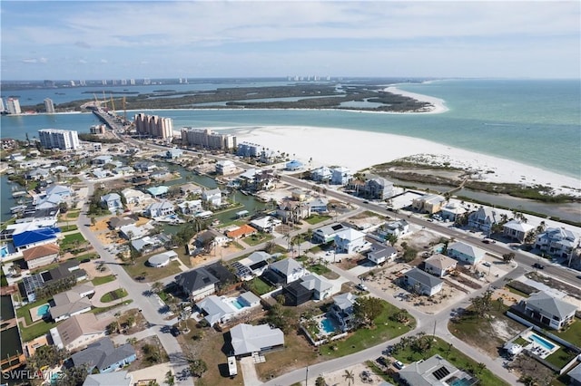 aerial view with a water view, a view of city, and a view of the beach