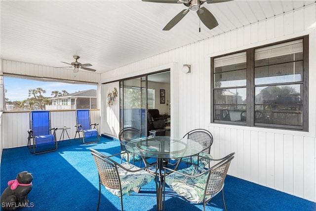 view of patio featuring outdoor dining space and ceiling fan