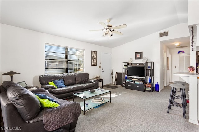 carpeted living room featuring visible vents, a ceiling fan, and vaulted ceiling