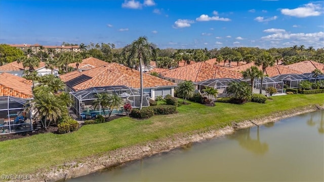 drone / aerial view with a water view