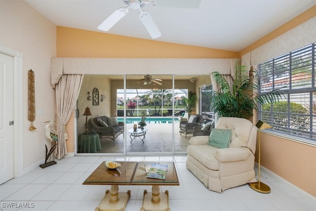 interior space with a ceiling fan and vaulted ceiling