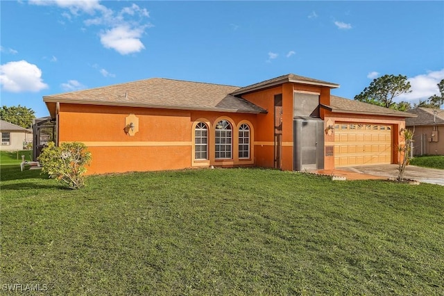 view of front of home with driveway, a front lawn, an attached garage, and stucco siding