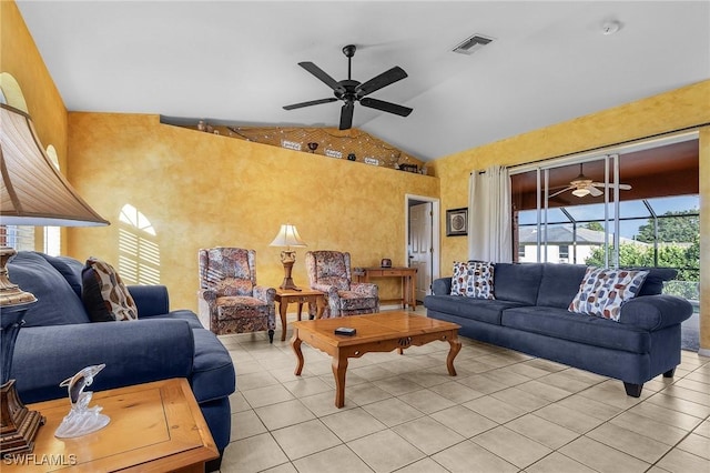 living room with lofted ceiling, light tile patterned floors, visible vents, and a ceiling fan