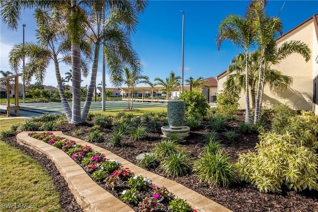 view of property's community with shuffleboard