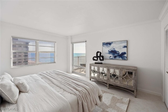 tiled bedroom with ornamental molding, access to outside, and baseboards