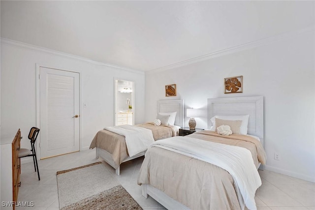 bedroom with crown molding, baseboards, and light tile patterned floors