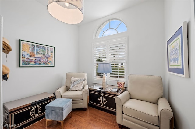 sitting room featuring wood finished floors