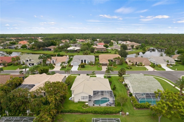 aerial view featuring a water view and a residential view