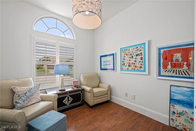 sitting room featuring wood finished floors and baseboards