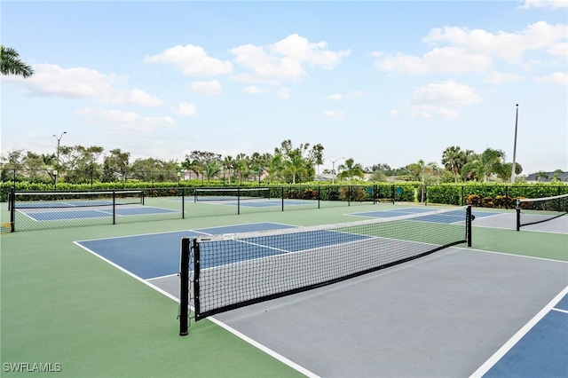 view of sport court with community basketball court and fence
