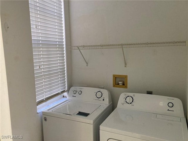 laundry room with laundry area and separate washer and dryer