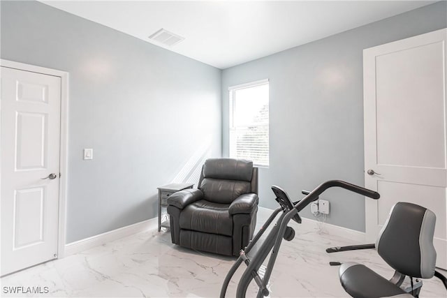 workout area featuring marble finish floor, visible vents, and baseboards