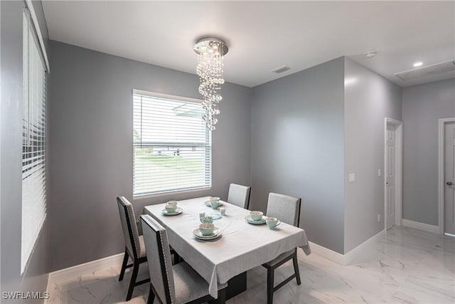 dining area featuring marble finish floor, a notable chandelier, recessed lighting, visible vents, and baseboards