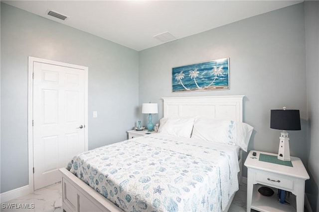 bedroom featuring marble finish floor, baseboards, and visible vents