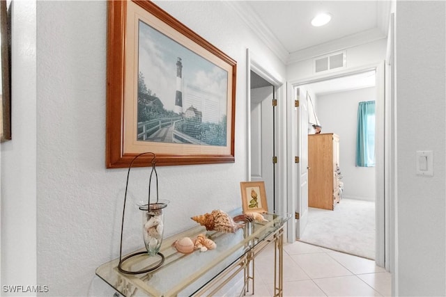 8261 Pathfinder Loop Unit 730, Fort Myers, FL 33919 - hall with crown molding, light tile patterned floors, light colored carpet, and a textured wall