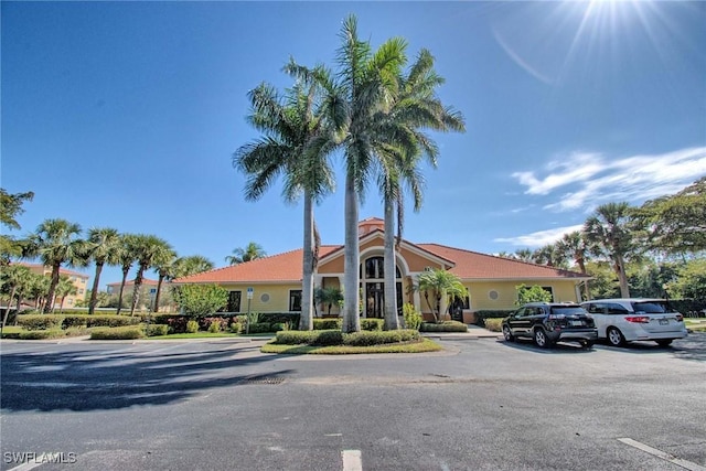 8261 Pathfinder Loop Unit 730, Fort Myers, FL 33919 - view of property featuring uncovered parking