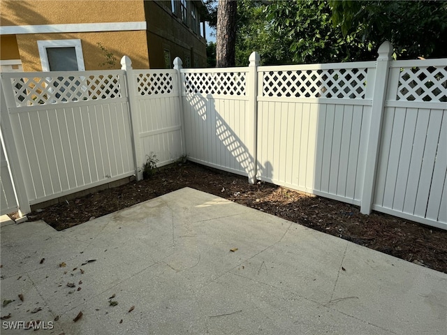 view of patio featuring a fenced backyard