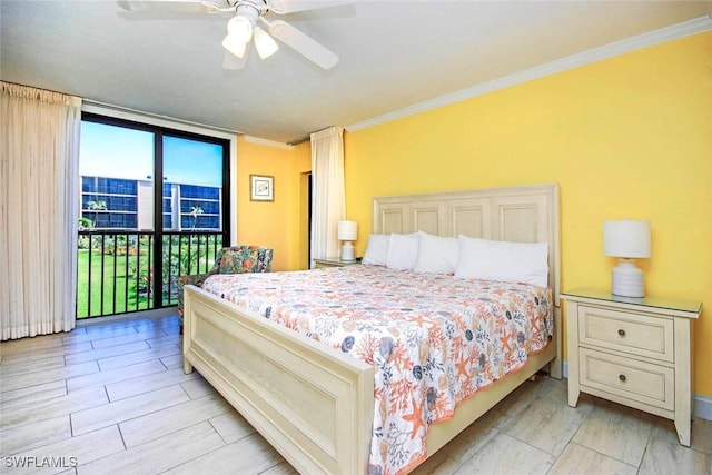 bedroom featuring access to exterior, ornamental molding, a wall of windows, and a ceiling fan