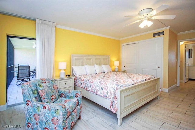 bedroom with baseboards, a ceiling fan, visible vents, and crown molding