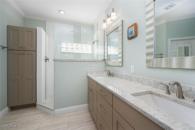 full bathroom with ornamental molding, double vanity, a sink, and a walk in shower