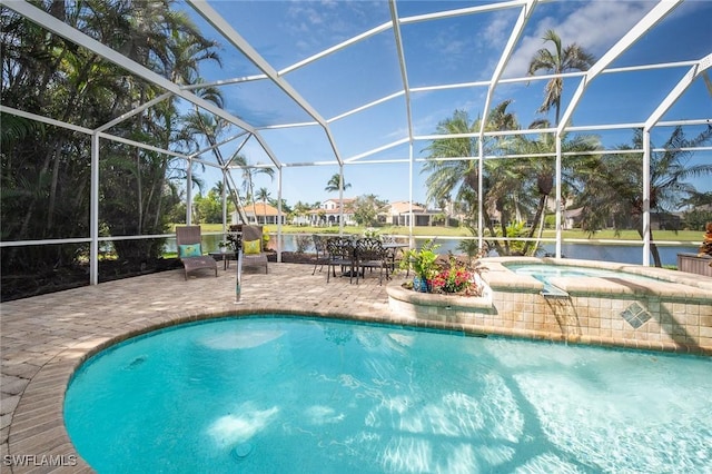 outdoor pool with a patio, glass enclosure, and an in ground hot tub