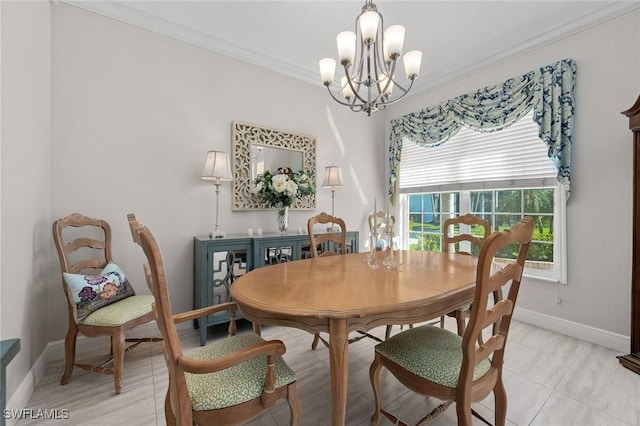 dining space featuring a chandelier, crown molding, and baseboards