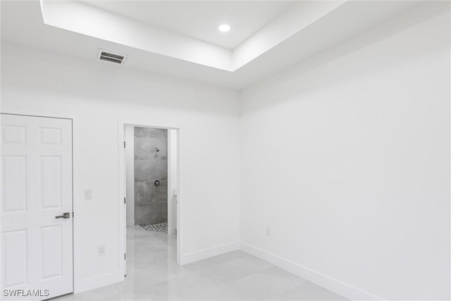 unfurnished room featuring recessed lighting, visible vents, and baseboards