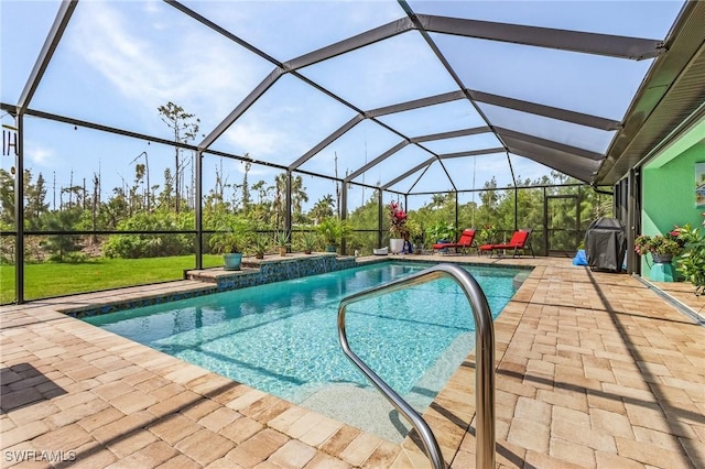 outdoor pool featuring a lanai, a patio area, and grilling area