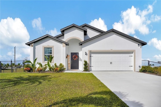 ranch-style home with driveway, an attached garage, fence, a front lawn, and stucco siding