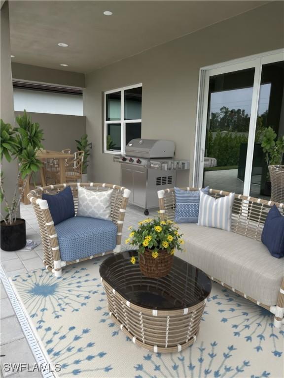 3608 Sapphire Cove Cir, Naples, FL 34114 - view of patio / terrace featuring a grill and outdoor lounge area