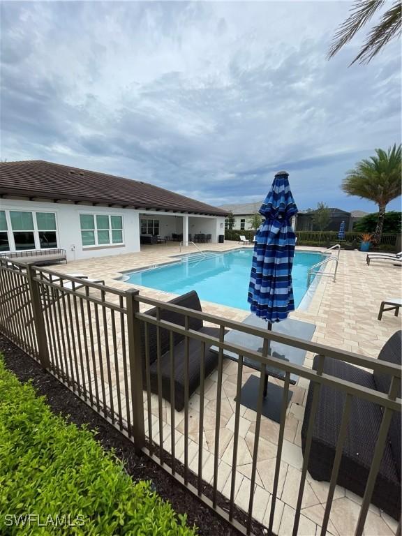 3608 Sapphire Cove Cir, Naples, FL 34114 - pool featuring a patio