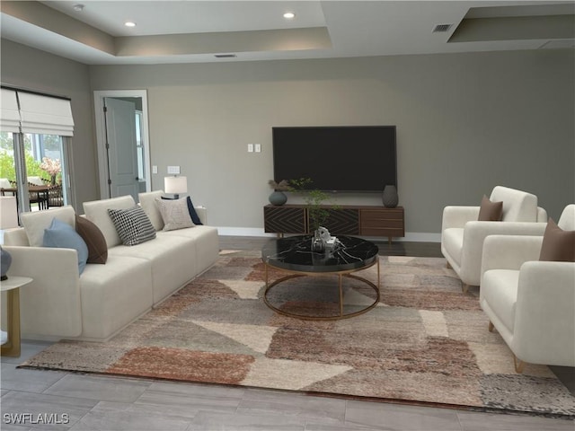 3608 Sapphire Cove Cir, Naples, FL 34114 - living room featuring baseboards, visible vents, recessed lighting, and a tray ceiling