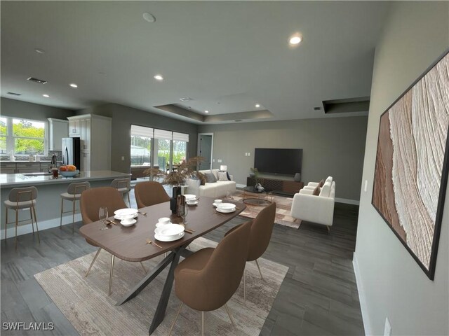 3608 Sapphire Cove Cir, Naples, FL 34114 - dining room with a wealth of natural light, a raised ceiling, recessed lighting, and baseboards