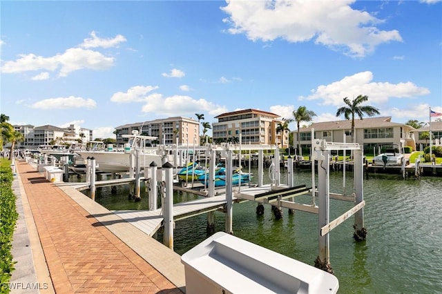907 Panama Ct Unit 303, Marco Island, FL 34145 - view of dock with boat lift and a water view
