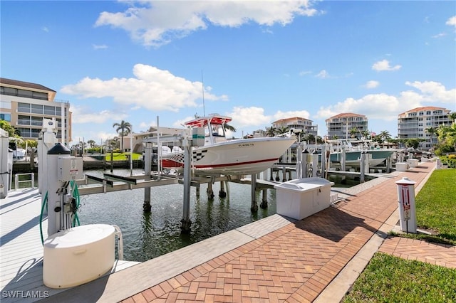 907 Panama Ct Unit 303, Marco Island, FL 34145 - dock area with boat lift and a water view
