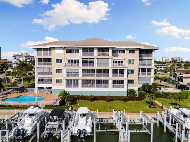 907 Panama Ct Unit 303, Marco Island, FL 34145 - view of building exterior featuring boat lift