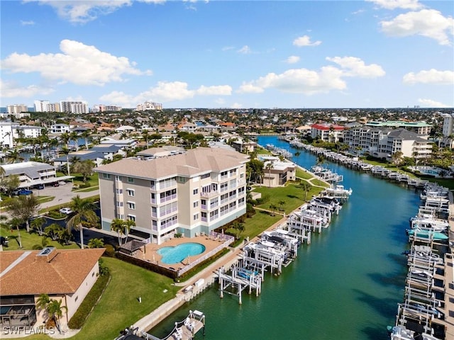 907 Panama Ct Unit 303, Marco Island, FL 34145 - drone / aerial view with a water view
