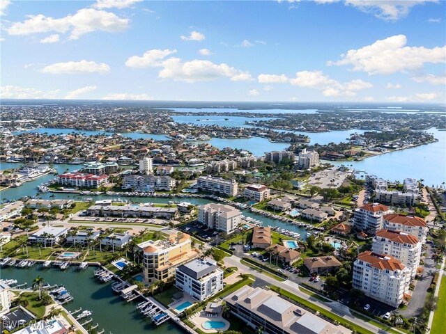 907 Panama Ct Unit 303, Marco Island, FL 34145 - drone / aerial view featuring a water view and a city view