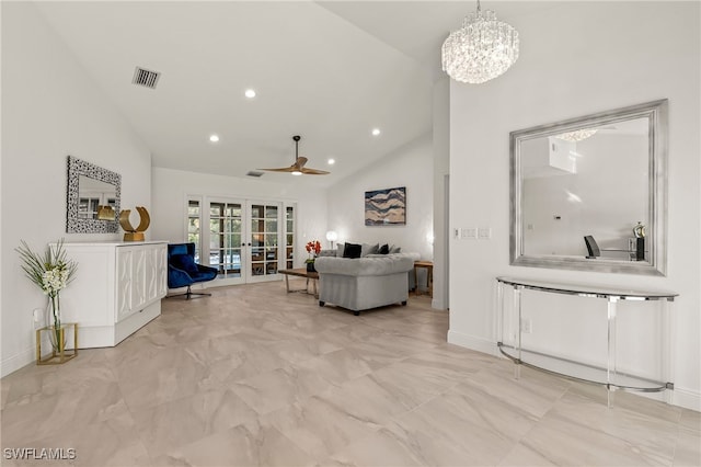 living room with visible vents, ceiling fan with notable chandelier, french doors, high vaulted ceiling, and recessed lighting