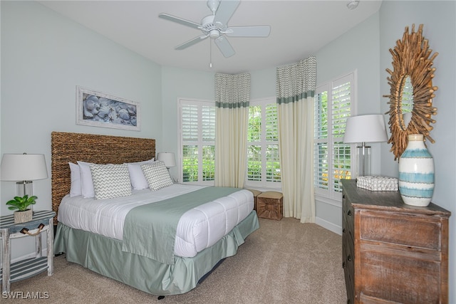 carpeted bedroom with ceiling fan