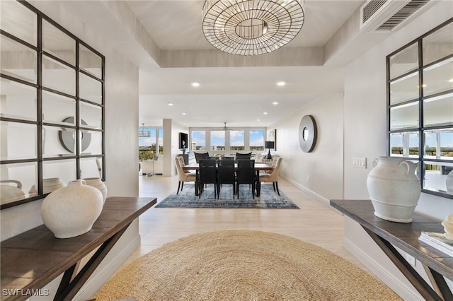 dining room with baseboards, visible vents, and recessed lighting