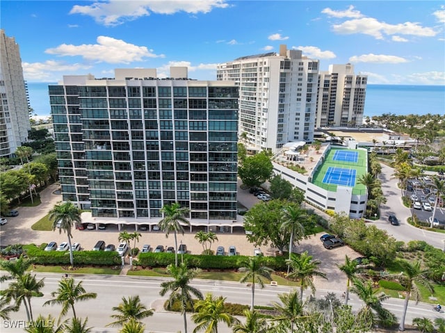 view of property featuring a view of city and a water view