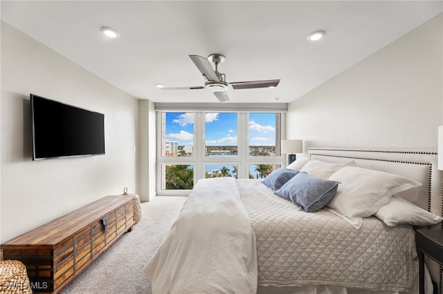 bedroom with carpet, ceiling fan, and recessed lighting